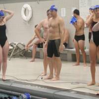 Swimmers prepare for the race